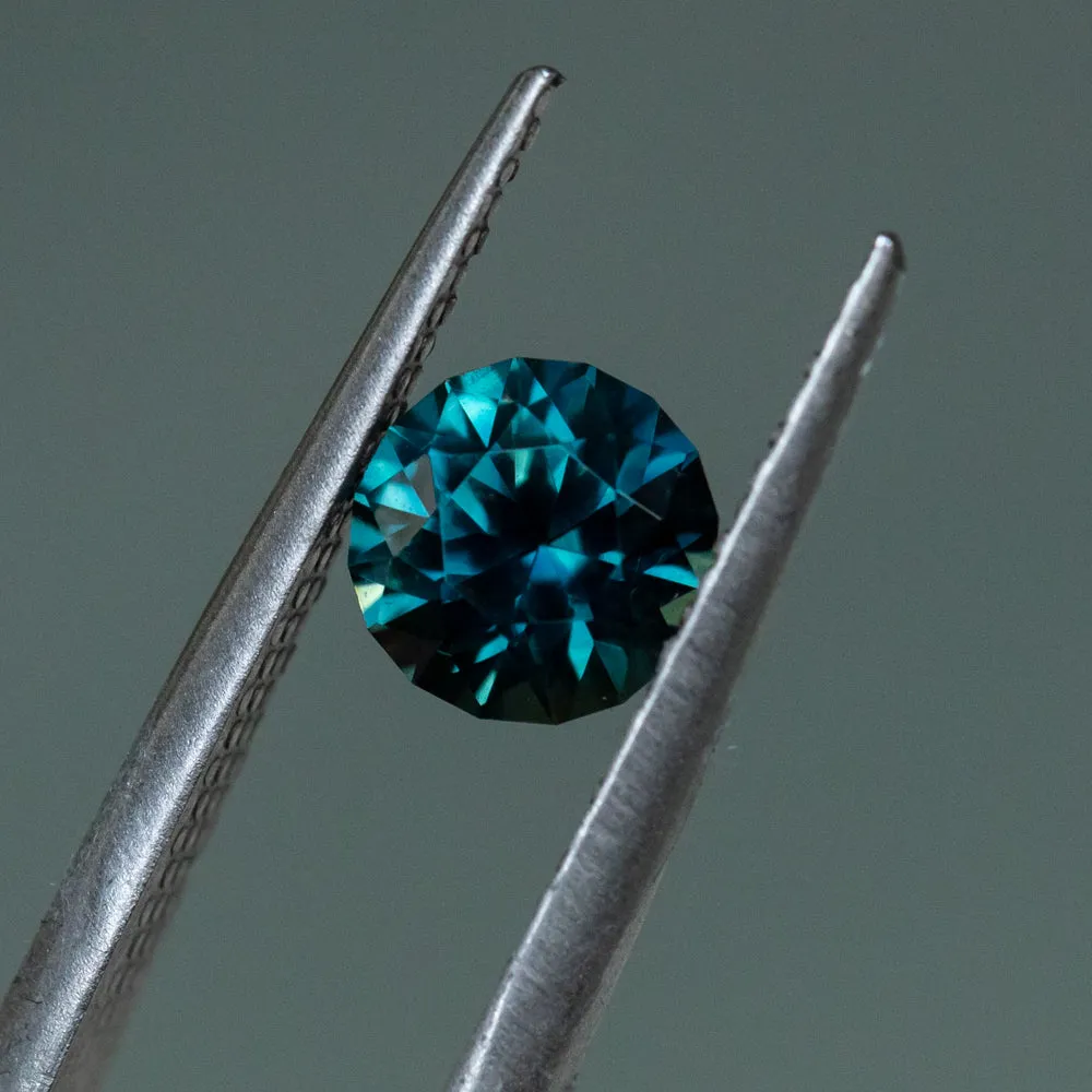 1.60CT ROUND NIGERIAN SAPPHIRE, UNTREATED, DEEP TEAL BLUE GREEN, 6.8X4.6MM