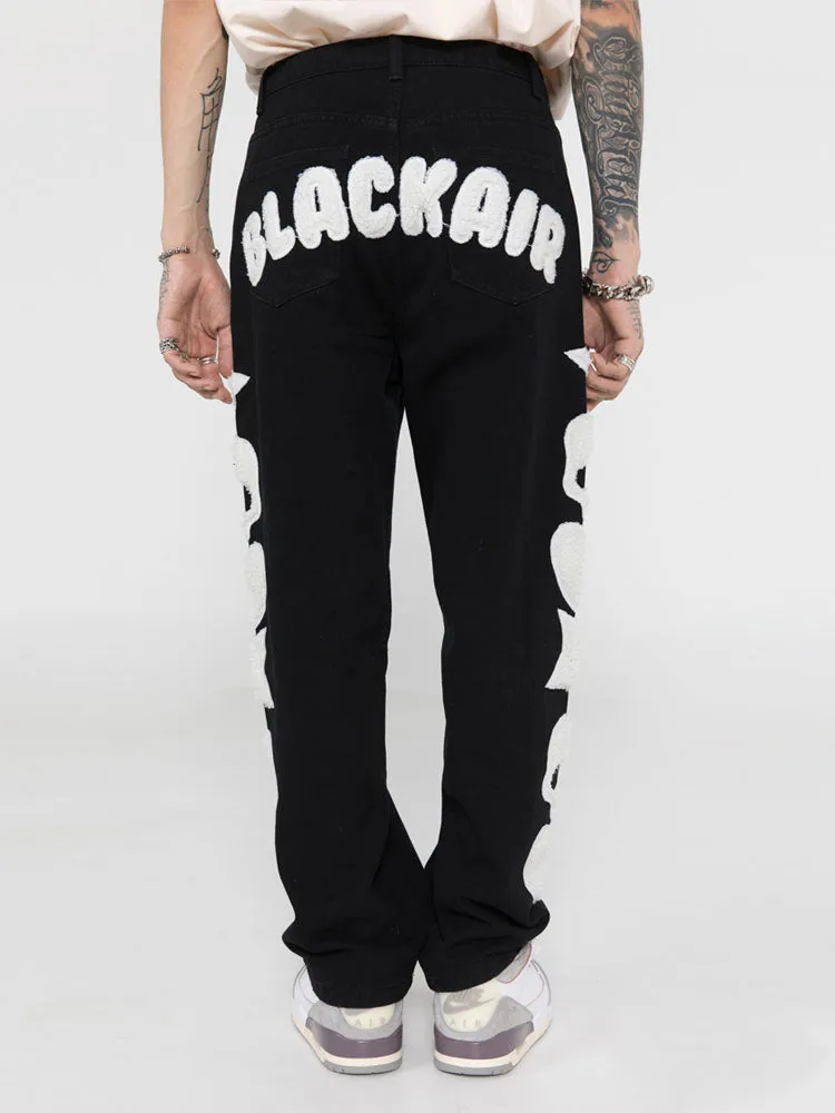 BLACK AIR Skull and Star Applique Jeans